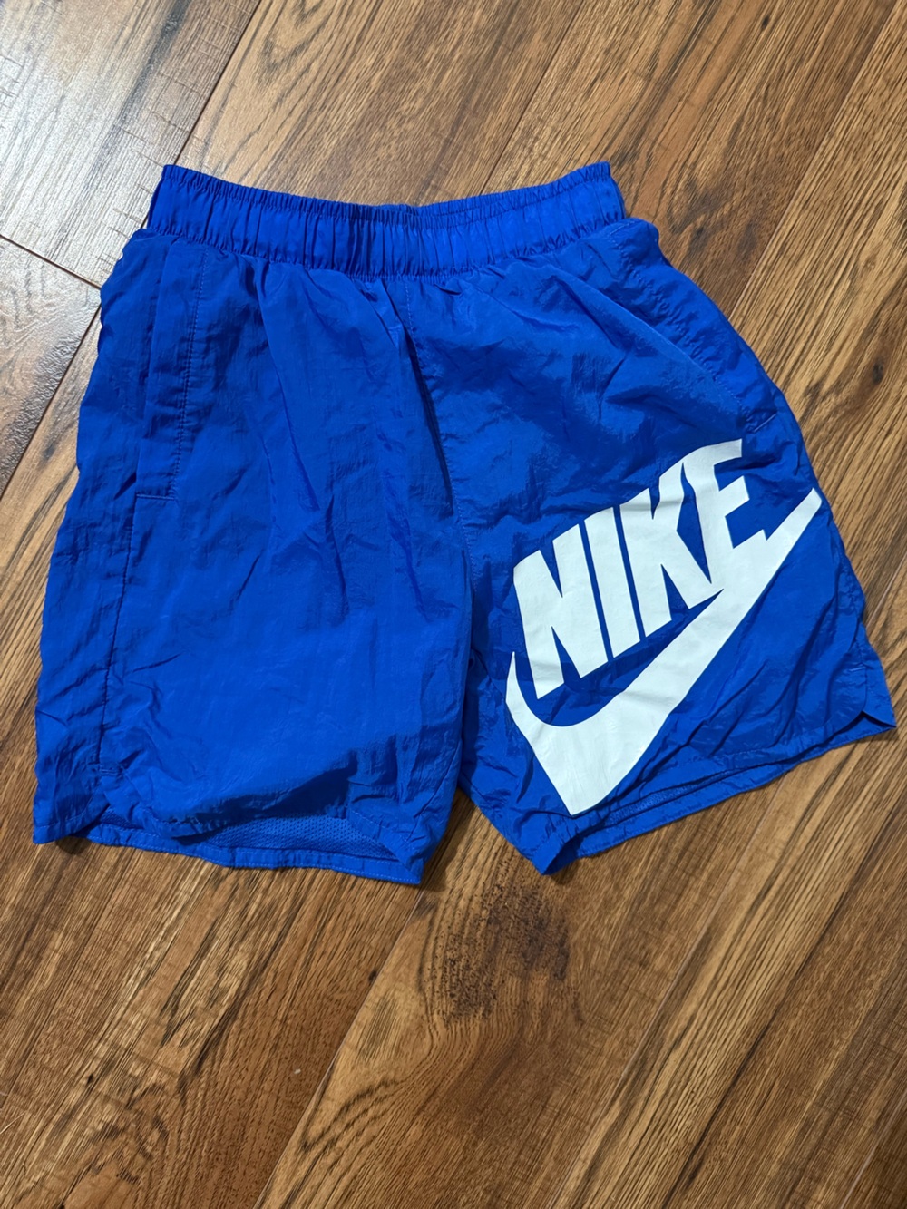 Nike Royal Blue kids Athletic Shorts with White Logo size medium